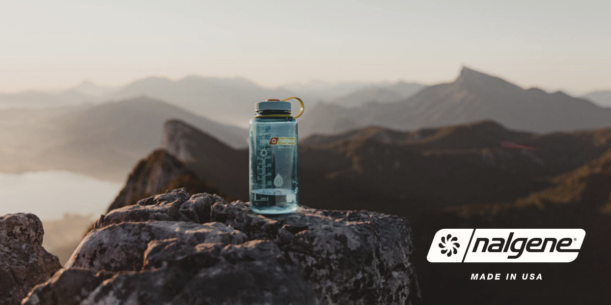 Nalgene water bottle on a mountain top.