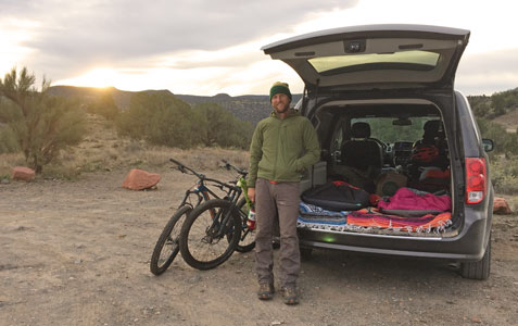 Ryan car camping and enjoying a sunset.