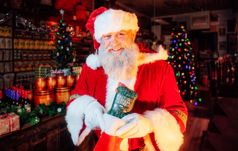 Santa is stuffing stockings